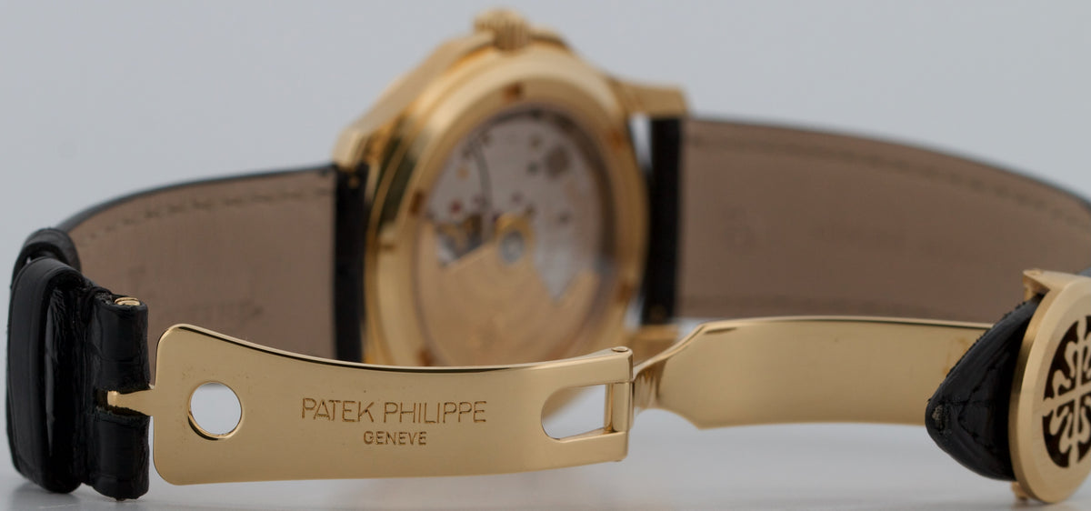 Patek Philippe Aquanaut 5060SJ 36mm Black 18K Yellow Gold Automatic Watch