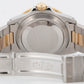 Rolex Submariner Date 18K Yellow Gold Black Stainless Steel 40mm 16803 Watch