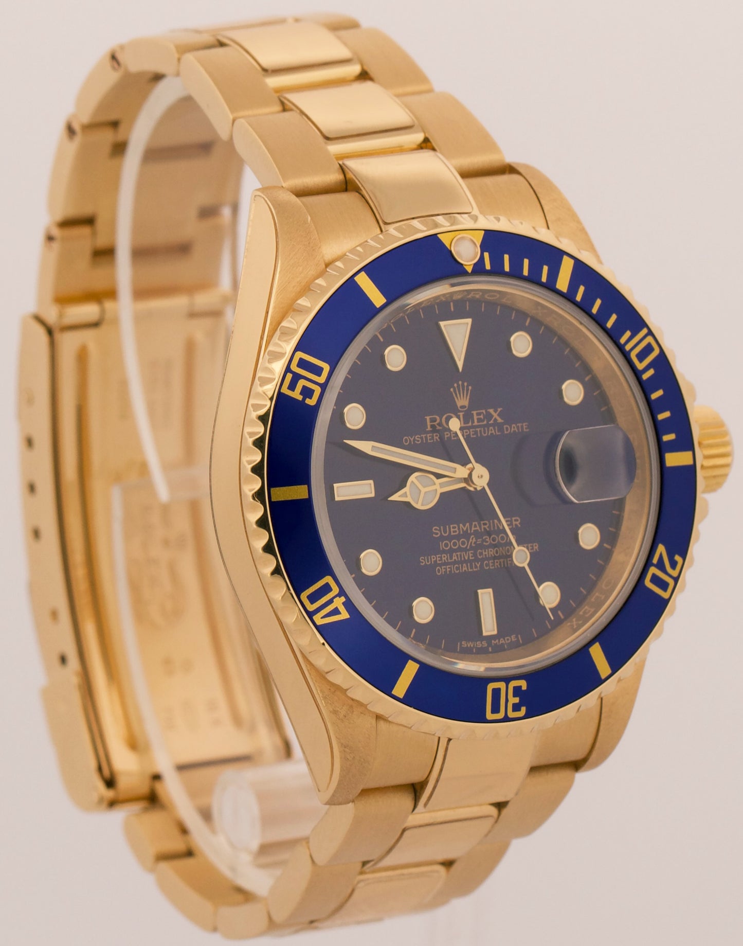 2009 Rolex Submariner Date 16618 Blue Rehaut No-Holes 18K Gold 40mm Box Papers