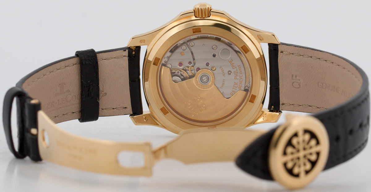 Patek Philippe Aquanaut 5060SJ 36mm Black 18K Yellow Gold Automatic Watch