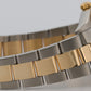 Rolex Oyster Perpetual Date 34mm CHAMPAGNE 18K Steel Engine-Turned Oyster 15233