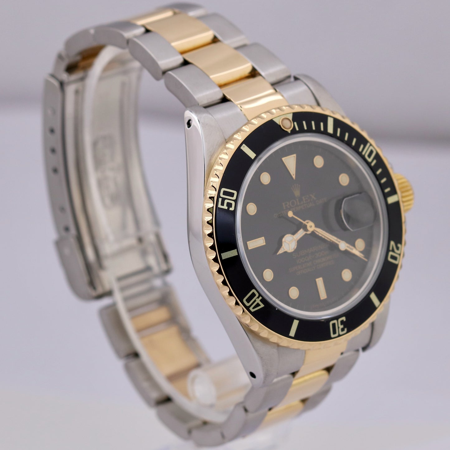 Rolex Submariner Date Black Two-Tone 18K Yellow Gold 40mm Stainless Oyster 16803