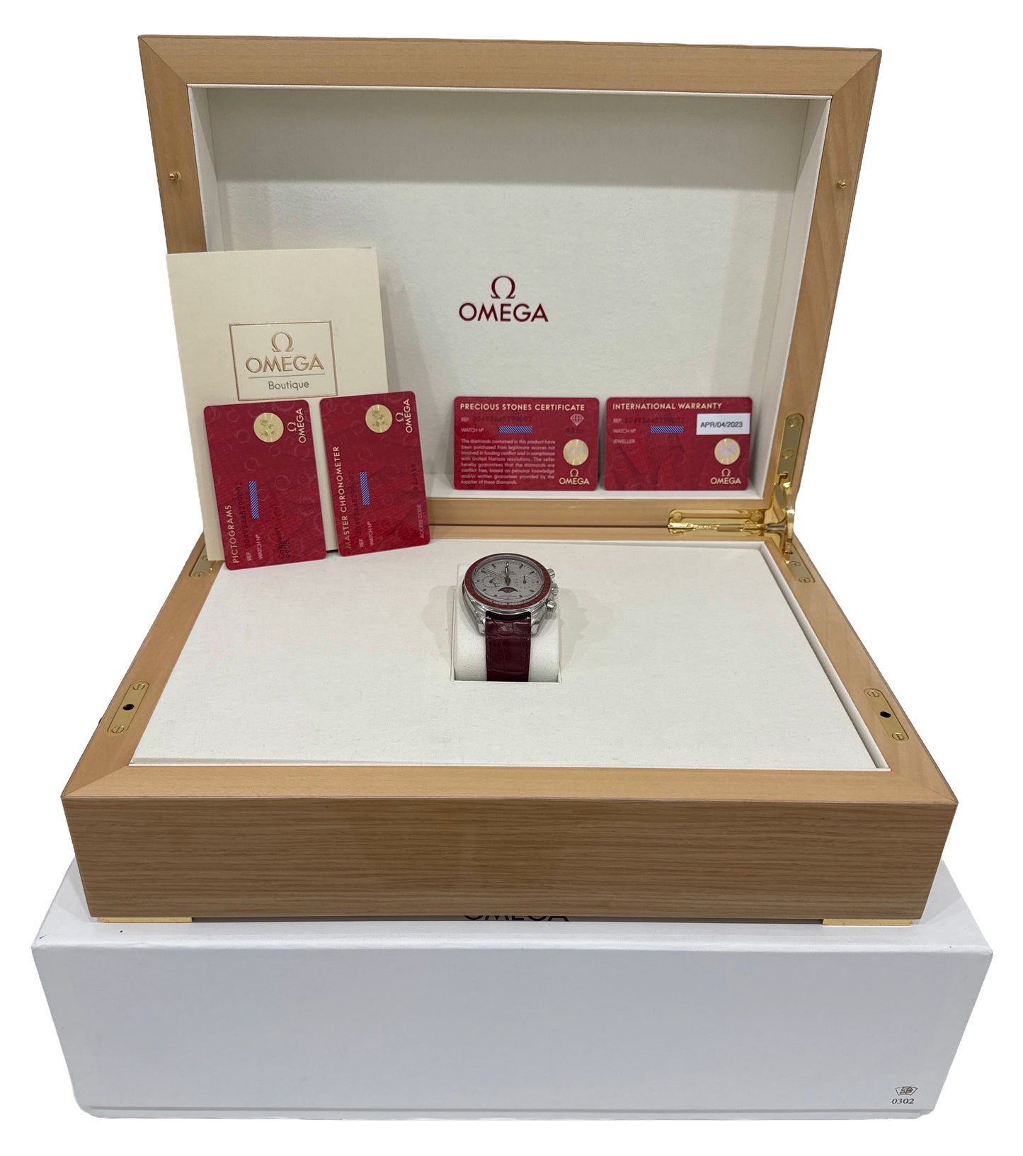 PAPERS Omega Speedmaster Moonphase PLATINUM RUBY 44mm 304.93.44.52.99.002 BOX